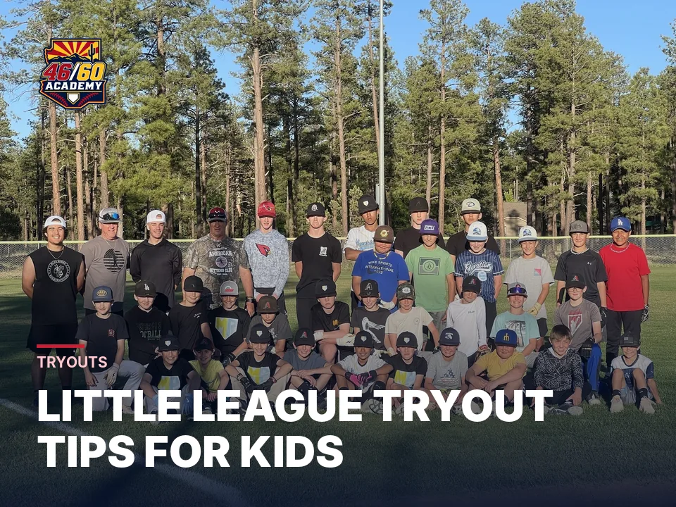 A large group of young players together on the field at a 46/60 camp